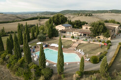 Aerial view of a wedding venue with cypress trees