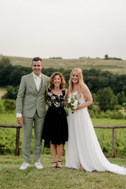 Bride and groom with guests on the wedding day