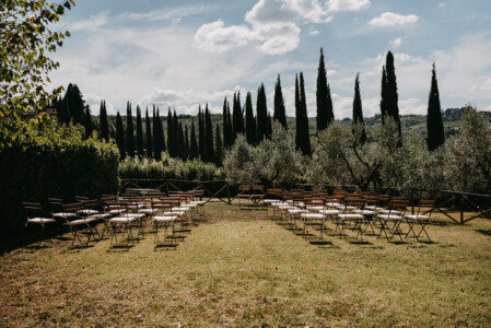 Symbolic ceremony set-up among cypress trees